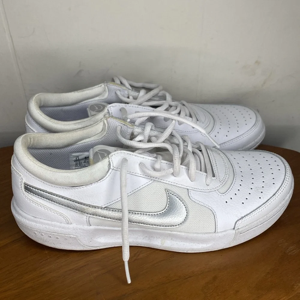 Nike White Sneakers with Silver Swoosh
